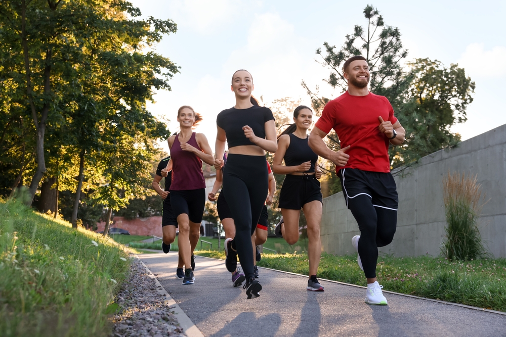 Group of people running outdoors